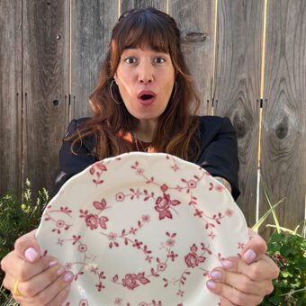 Smashing Dishes Linda holding patterned plate