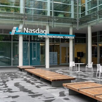 outside of Nasdaq Entrepreneurial Center with tables and benches