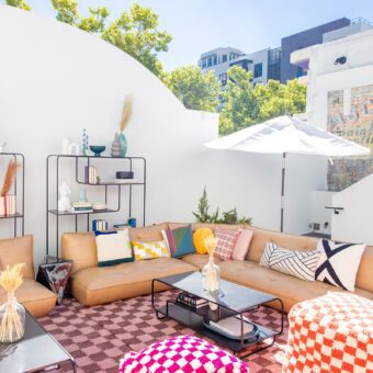 rooftop lounge with tan and gray modern furniture