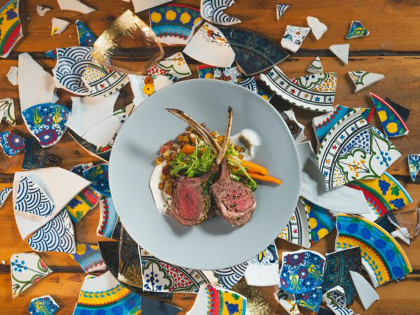 Lamb chops on a decorative smashed plate